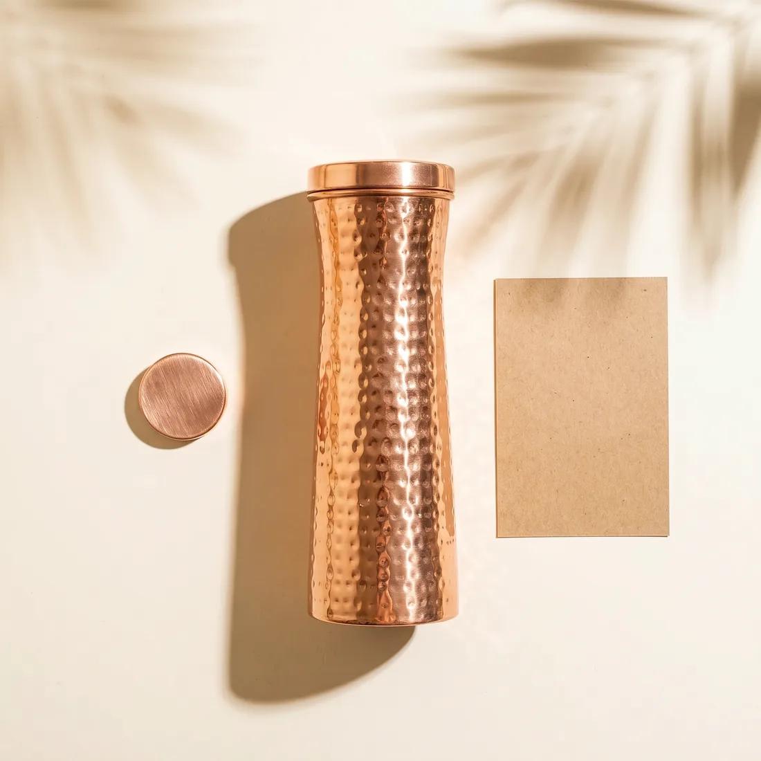 What's inside every Coppora box: the hand-hammered copper carafe, a magnet self-test, and the care guide.